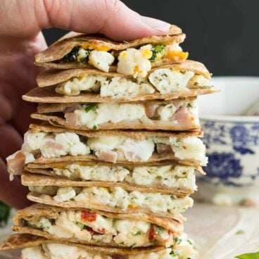 These Make Ahead Breakfast Quesadillas are the perfect healthy breakfast, lunch or dinner! They're easy to make for your week's meal prep, freezer friendly and totally customizable. A step by step recipe video shows you 4 different ways to make them: Broccoli Cheddar; Three Cheese Pesto; Roasted Red Pepper, Spinach and Parmesan; and Denver. | meal prep | make ahead breakfast | freezer breakfast quesadillas | freezer meal | #mealprep #makeahead #breakfast #freezermeal