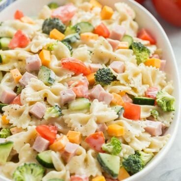 creamy ranch bowtie pasta salad in a large bowl