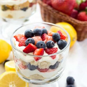 Lemon Berry Cheesecake Trifles: White cake cubes, no-bake lemon cheesecake filling and fresh berries make the perfect summer dessert! Use red and blue berries for a July 4th celebration, or use just red berries for a Canada Day celebration. Either way, it's going to be delicious! www.thereciperebel.com