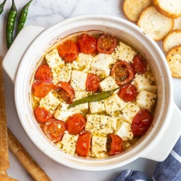 spicy baked feta with cherry tomatoes after baking.