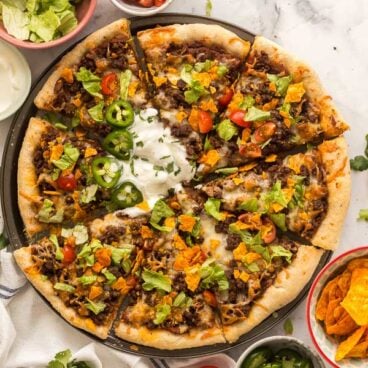 overhead image of taco pizza sliced