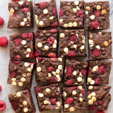 triple chocolate raspberry brownies overhead full pan cut into squares